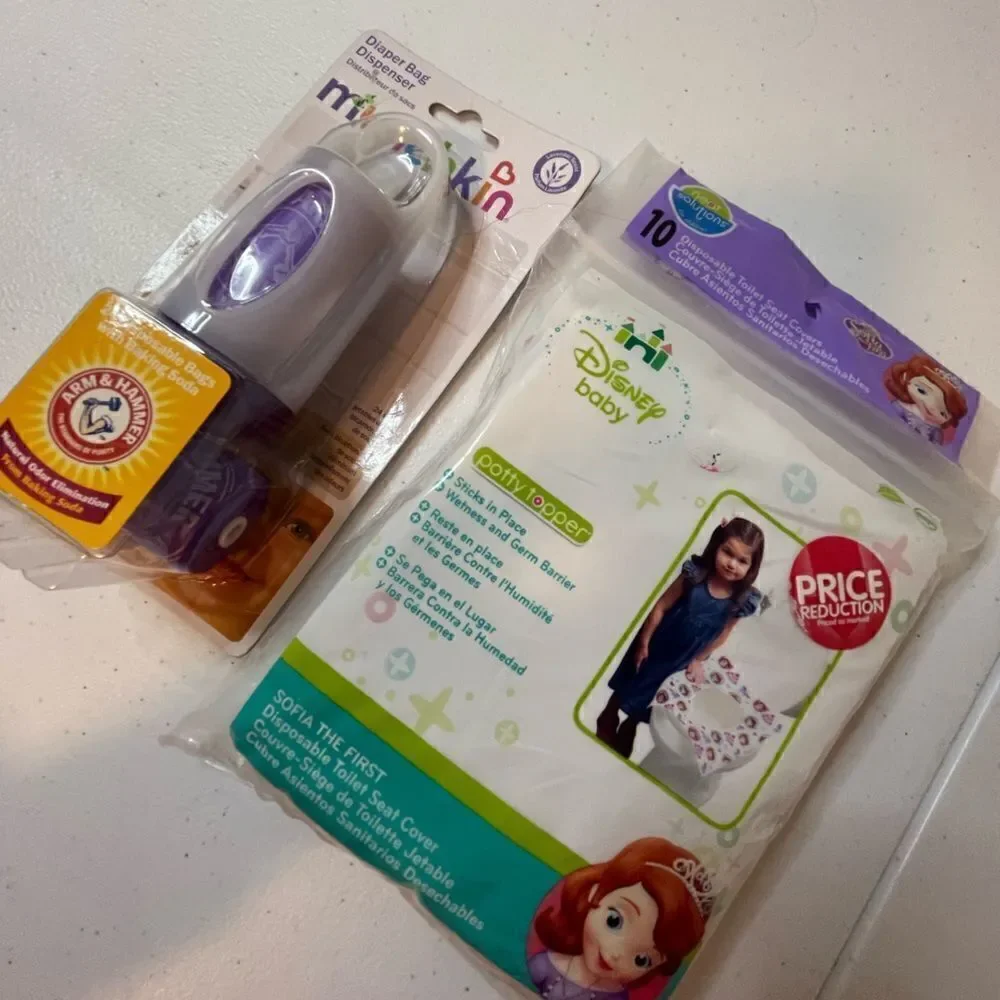 Disney Sophia potty covers and Munchkin diaper bag dispenser lot bundle